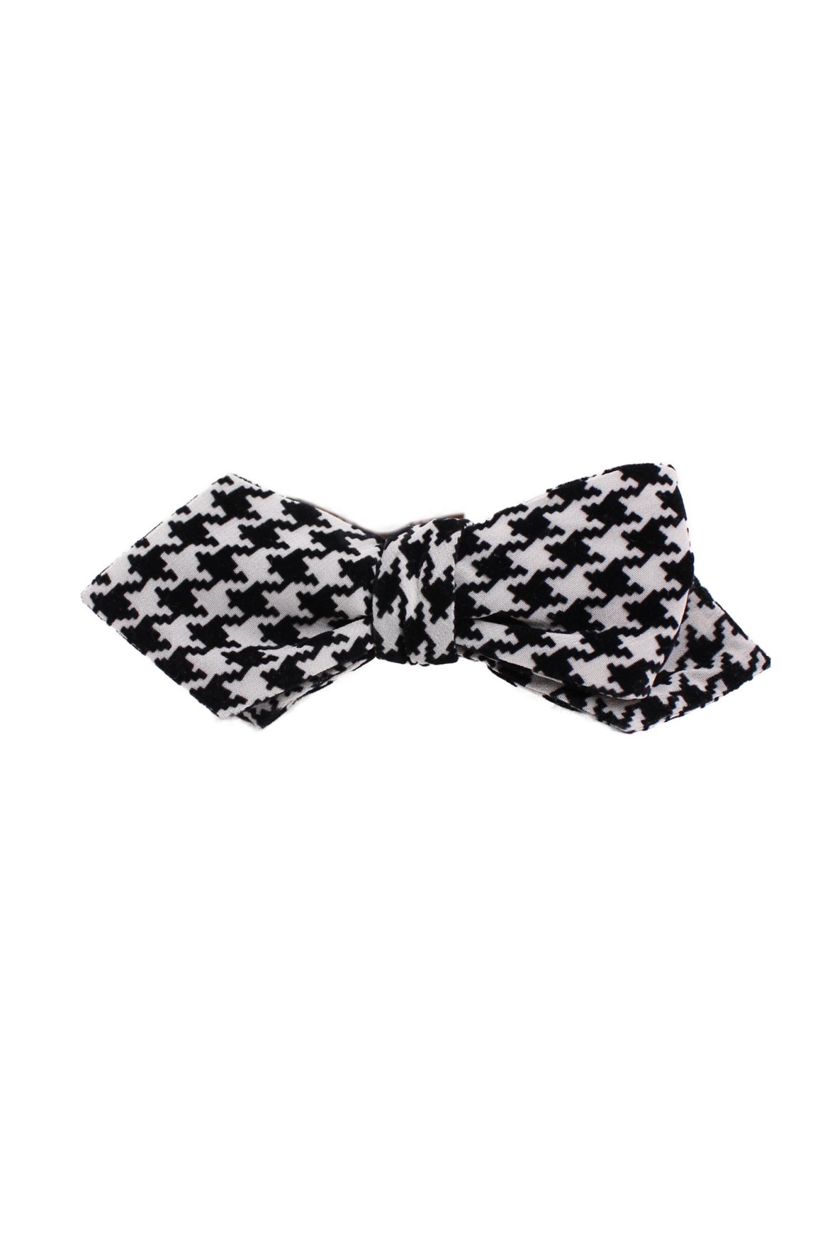 front angle of alexander olch black and white velvet houndstooth bowtie. features black on black pattern, brown satin backing, adjustable width, and pre-tied bow. 