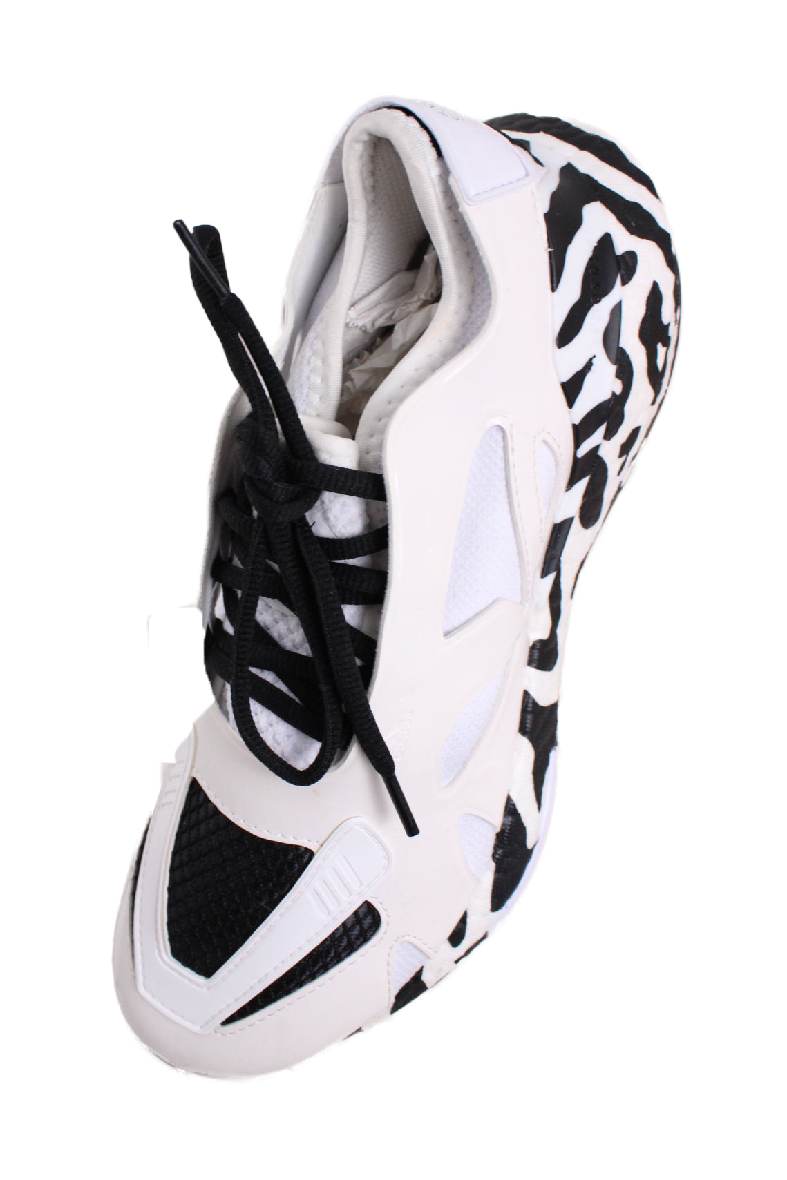 top side view with 'adidas x stella mccartney' logo debossed at sides of shoes.