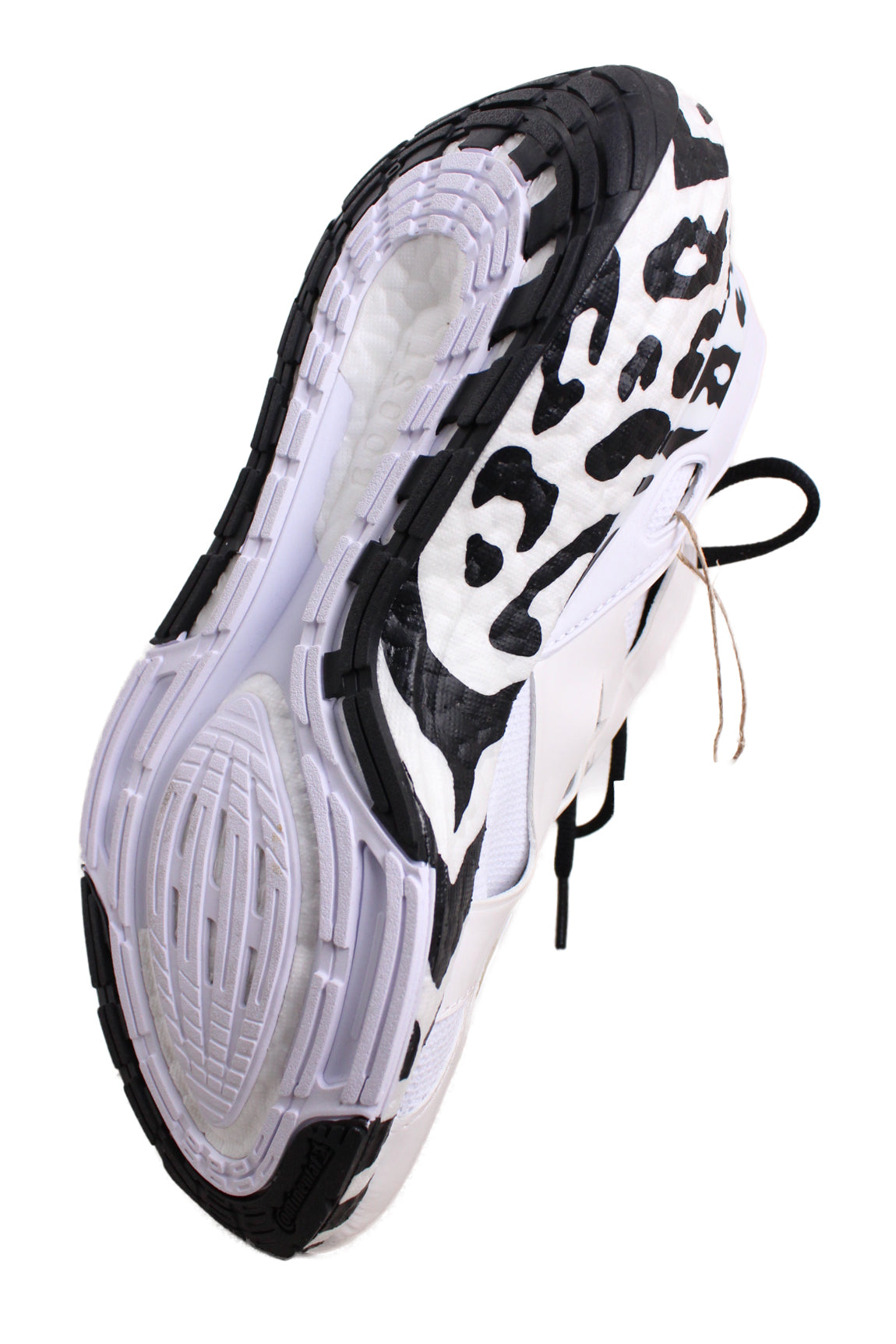 underside view with zebra pattern rubber sole of shoes.