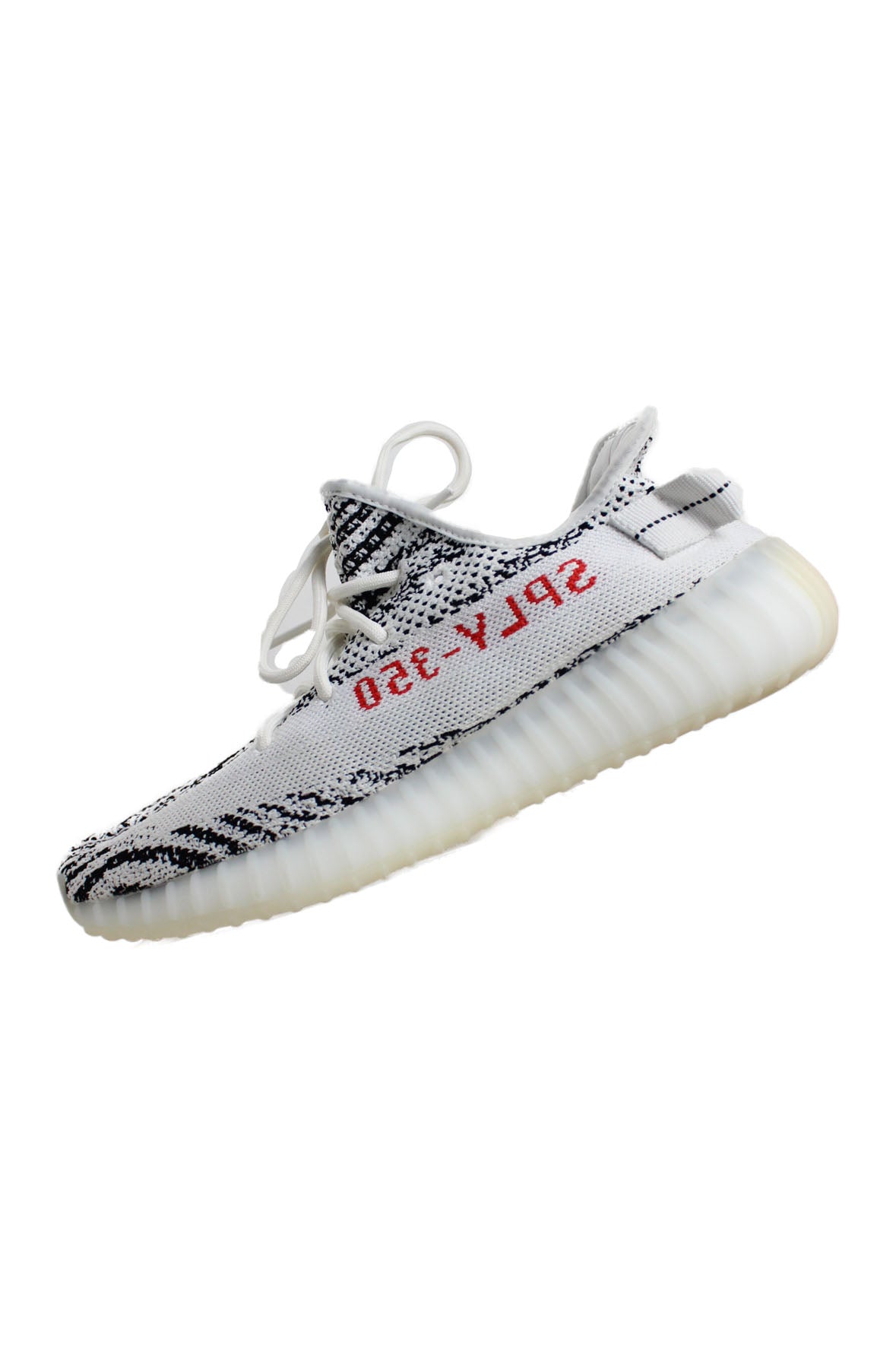 side view of adidas white/black/red ‘yeezy boost 350 v2 zebra’ shoes. features ‘350-ylps’ at uppers sides, top round lace closure, and chunky rubber sole.