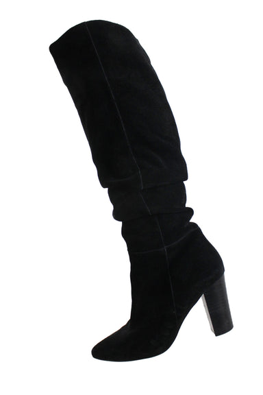 profile of treasure bond black suede high boots. features pointed toe, ruched shaft, and side zip closure.  