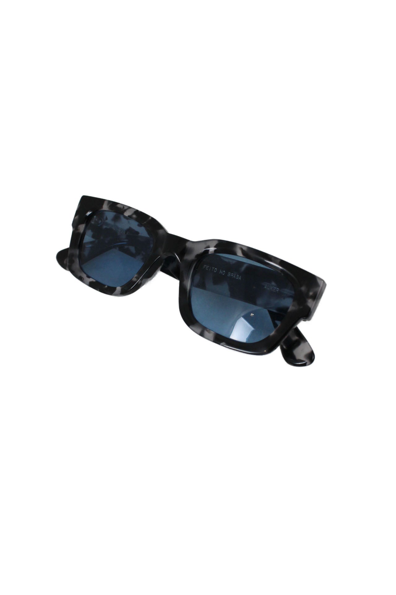 front of folded sunglasses. 