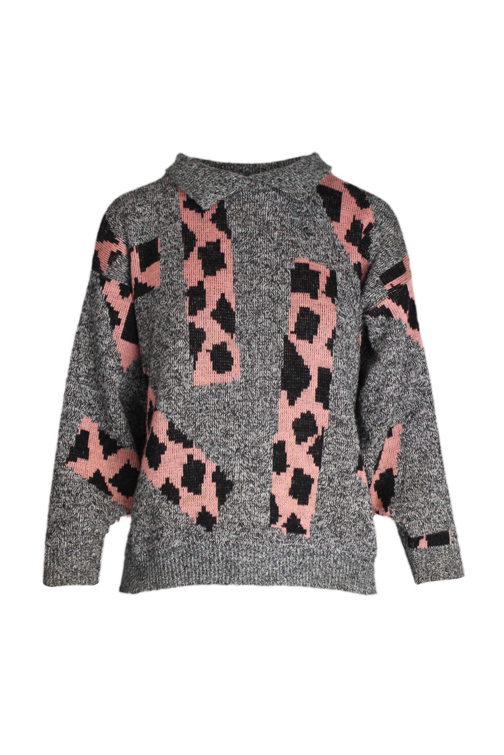 front of arielle gray and pink long sleeve sweater. features spread lapels, geometrical giraffe print, ribbed trims, and pull on style. 