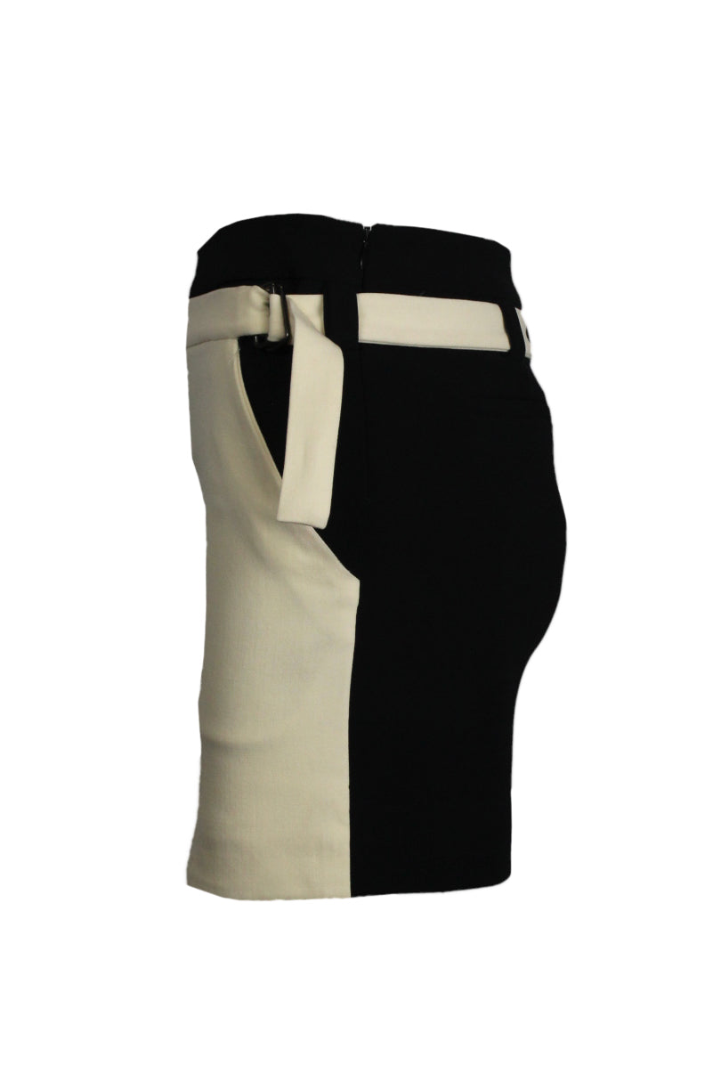 side view of proenza schouler black and cream mini skirt. features cream skirt panel with belt design detail. includes pockets and side zipper