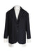front of frankie shop navy blue oversized blazer. features notched lapels, attached white shirt underneath, shoulder pads, welted pockets, button at cuffs, and double button closure. 