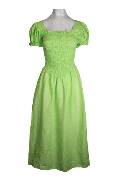 description: sleeper lime green linen short sleeve dress. features smocked bodice, square neckline, pullover style, and v cut at bodice. 