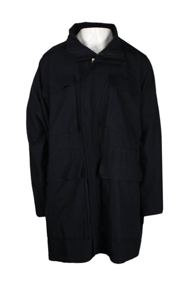 front view of raey navy velcro/two way zip up oversized jacket. features flap pockets at chest and waist, inner waist drawstring, adjustable velcro cuffs, and hood with velcro flaps.