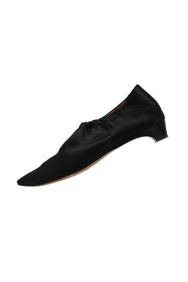 profile of derek lam black pointed toe slipper shoe. gathered black textile upper, elastic ankle cuff, and pointed toe. 1" kitten heel. leather lining and soles. 