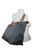 profile of bag displayed on mannequin torso