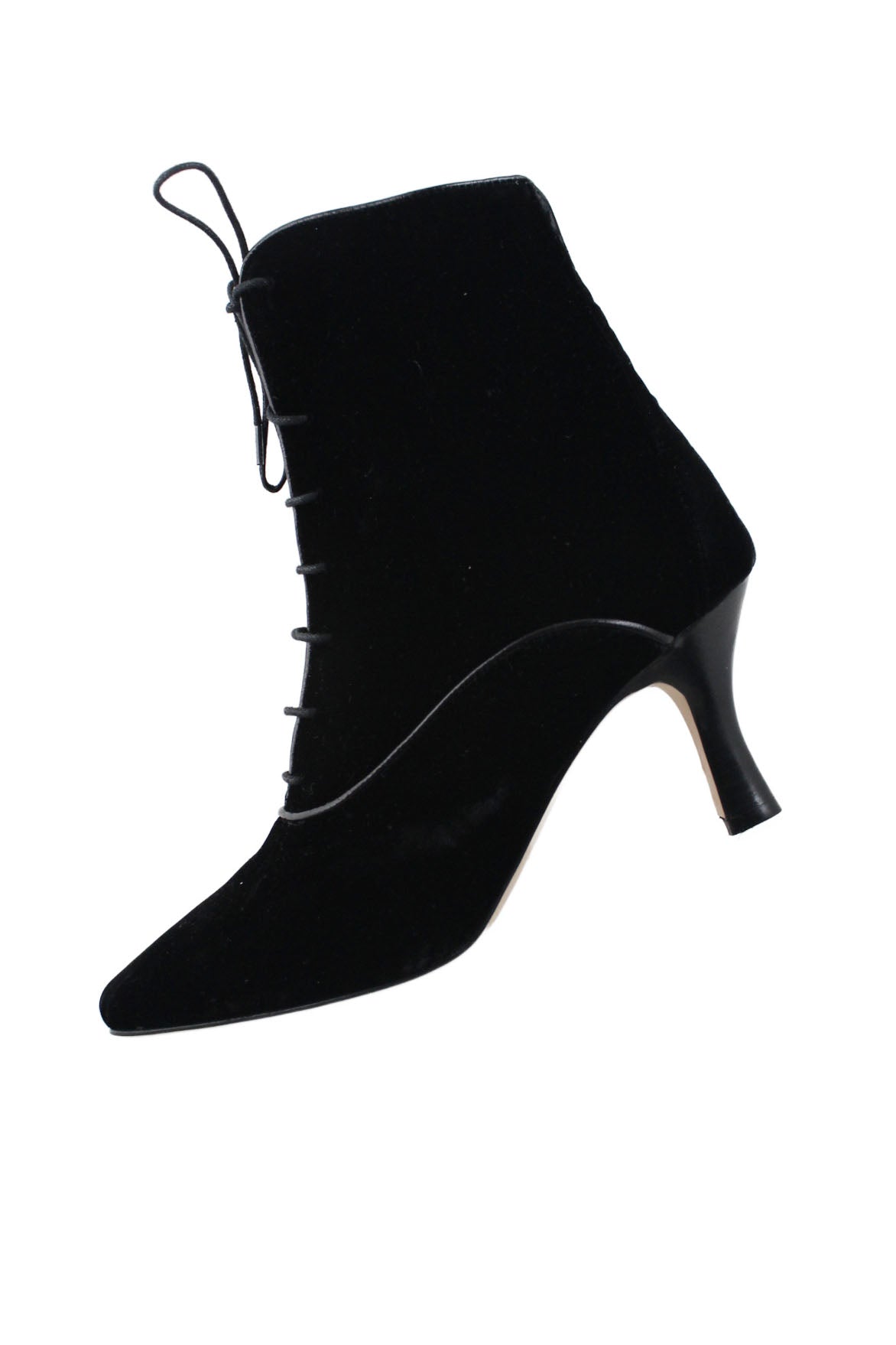 profile of doen black velvet ankle boots. features almond-shaped toe, a slim mid-height heel, leather trim, and lace up closure. 