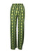 front of paloma wool green lounge pants. features graphic pattern throughout, high-rise, elasticized waistband, and pull on style. 
