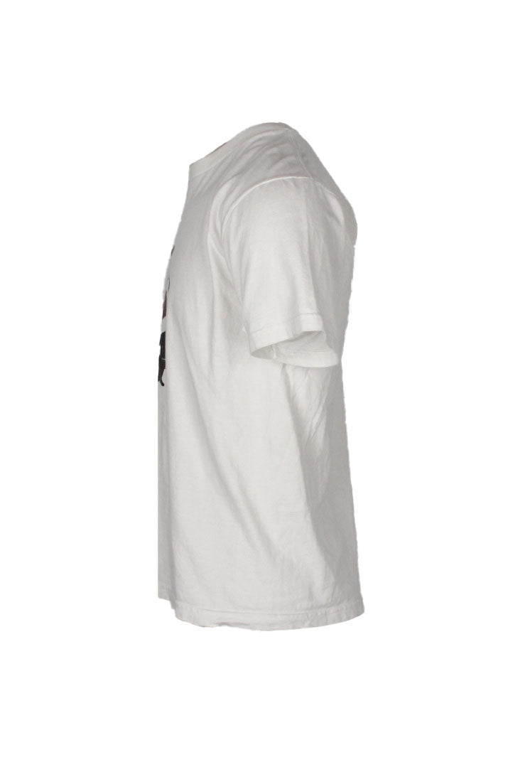 profile view with left sleeve of shirt.