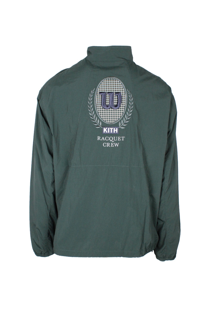 rear view with 'w kith racquet crew' logo graphic embroidered at back.