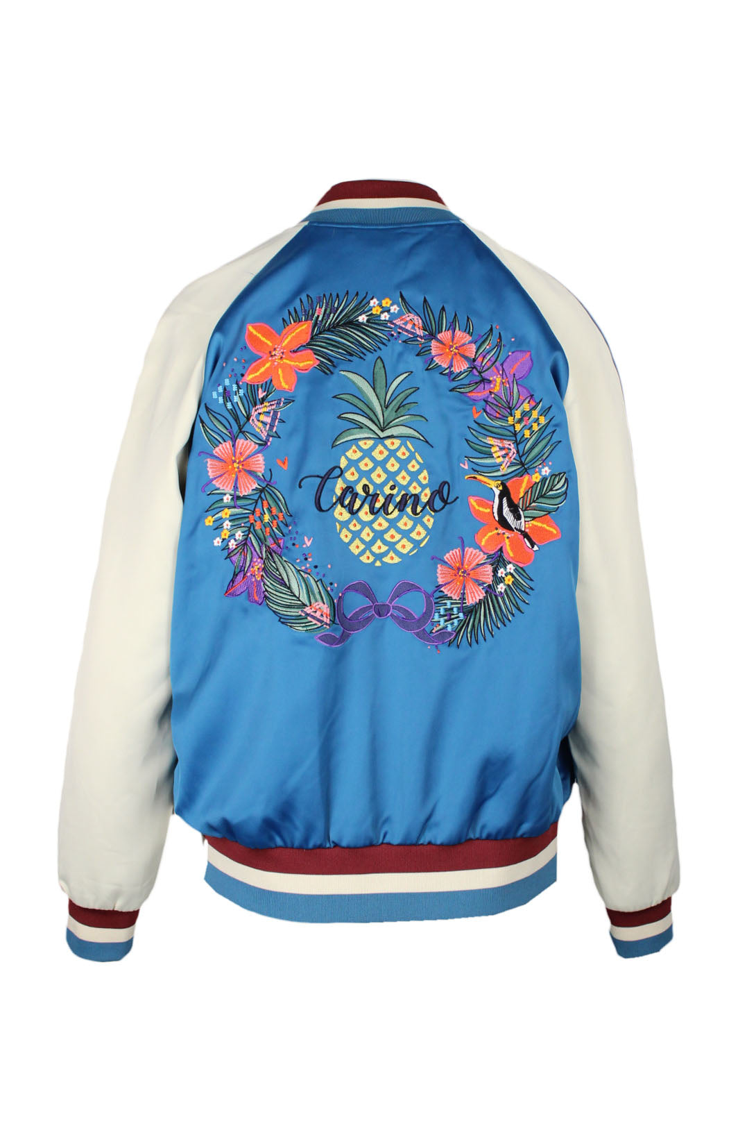 back of jacket. showing floral tropical embroidery and carino cursive type.