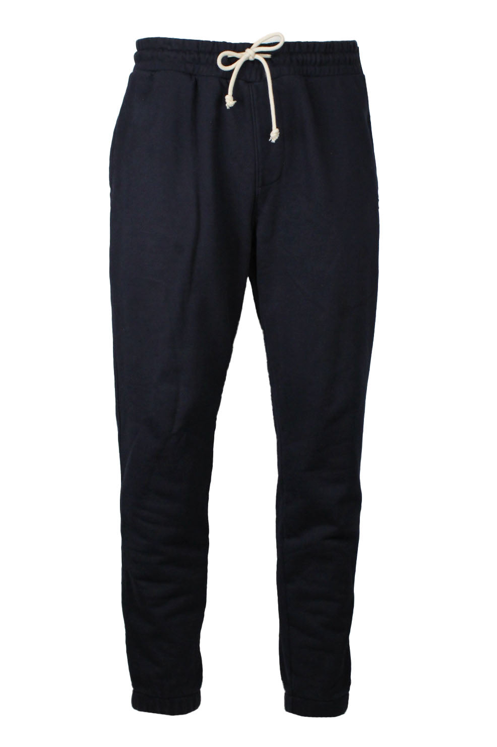 front view of kith navy cotton tapered sweatpants. features ‘kith’ logo patch at front left leg, side hand pockets, rear pocket, ribbed cuffs, and drawstring at elastic waist.