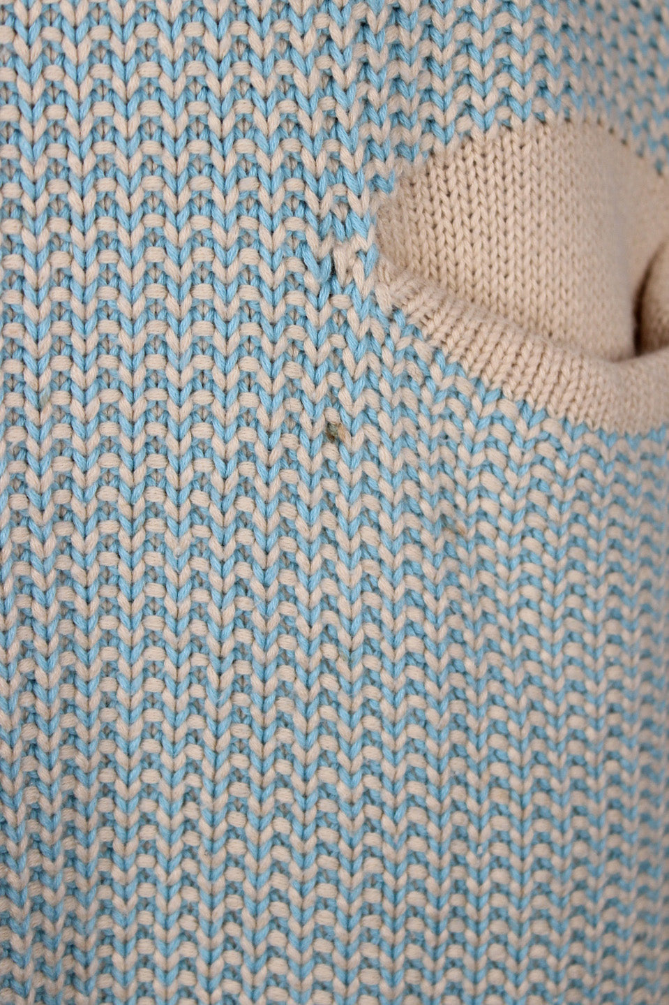 side of sweater.