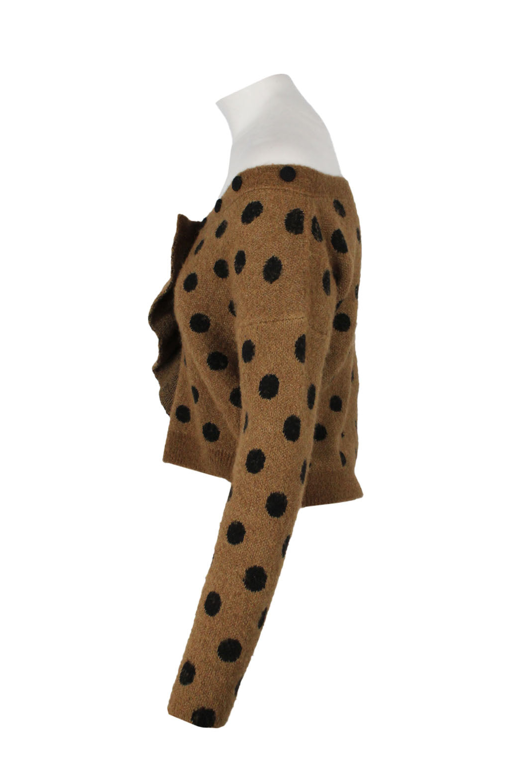 profile of sweater with polka dots print throughout. 