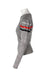 profile of gray sweater highlighting ribbon detail around the arm