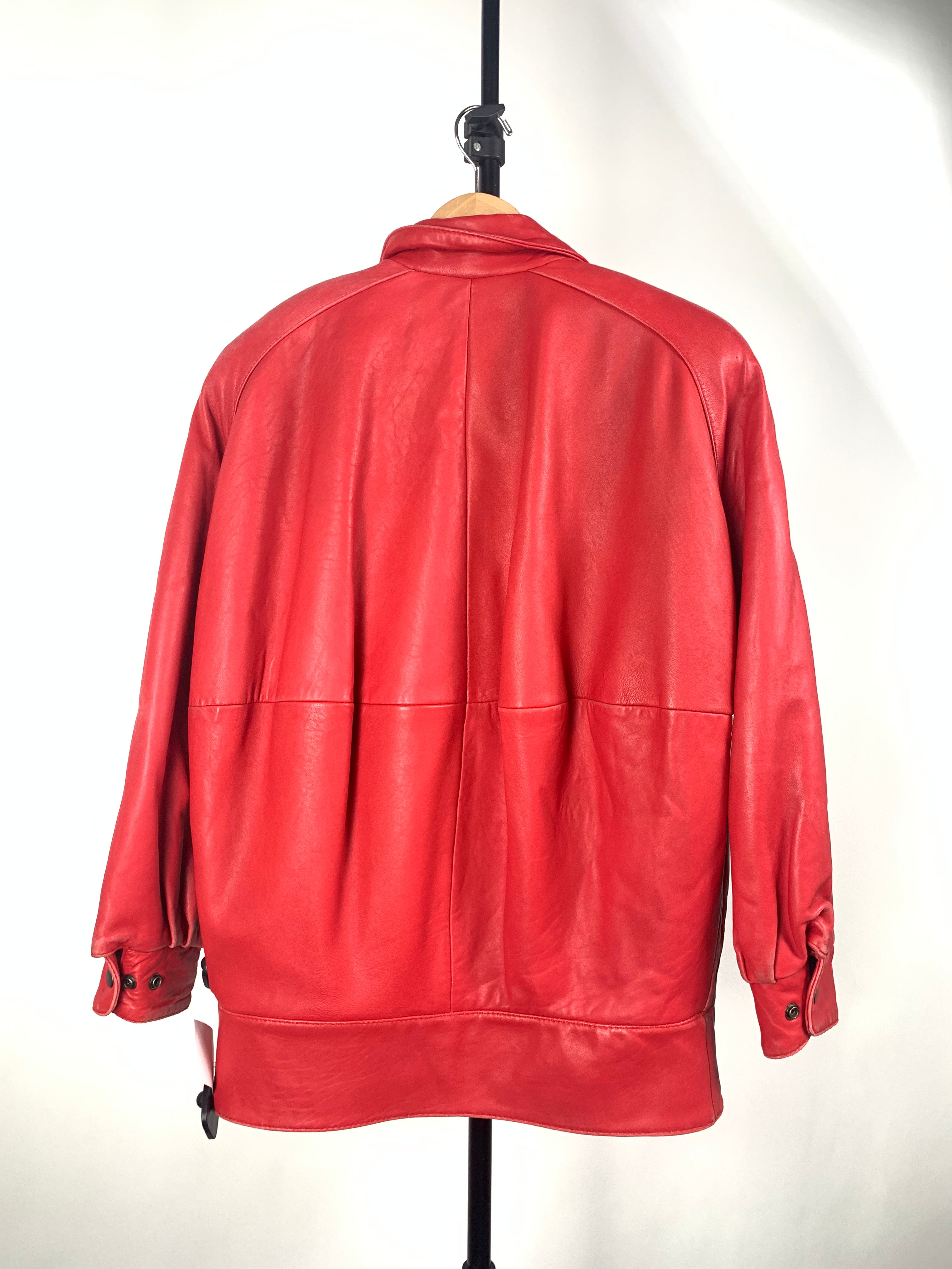 Red leather jacket back against a white background
