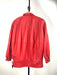 Red leather jacket back against a white background