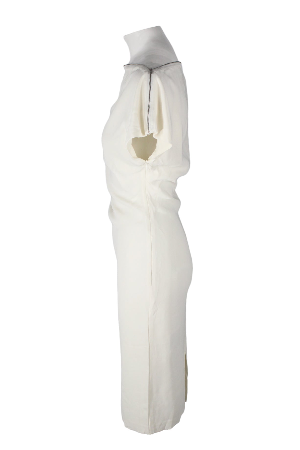 profile of dress displayed on full mannequin, showing neckline zipper. 
