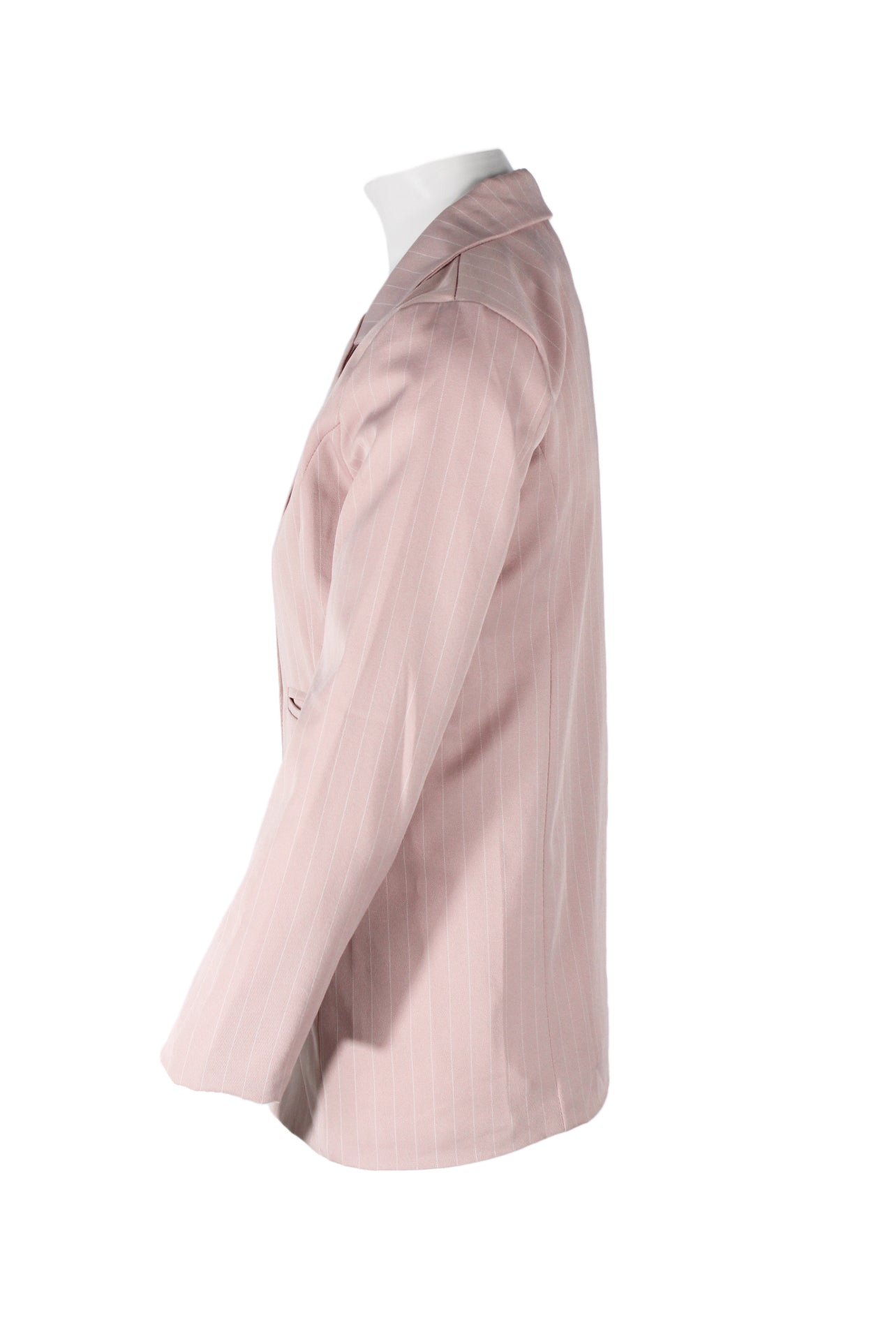 profile angle of w•z dusty pink and white pinstripe blazer on feminine mannequin bust featuring jetted front pockets.
