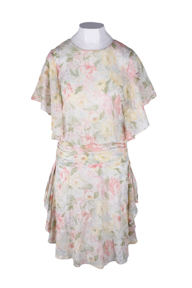 front of vintage cream print short sleeves midi dress. features floral print throughout, crew neckline, ruffled sleeves/hem, and draped detail at waist.