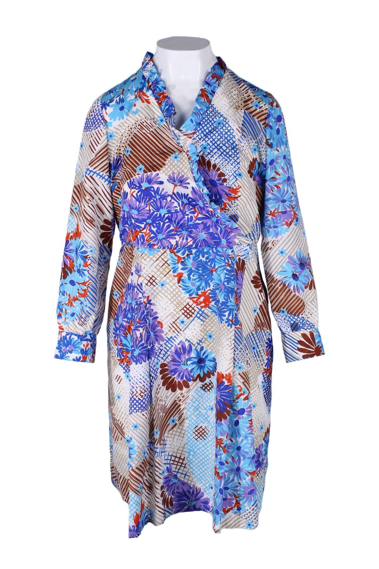 front of vintage blue long sleeve midi dress. features floral print throughout, v neckline with snap button, ruffled detail at neck, wrap design at top, slit and single button at cuffs, and skirt slightly pleated.