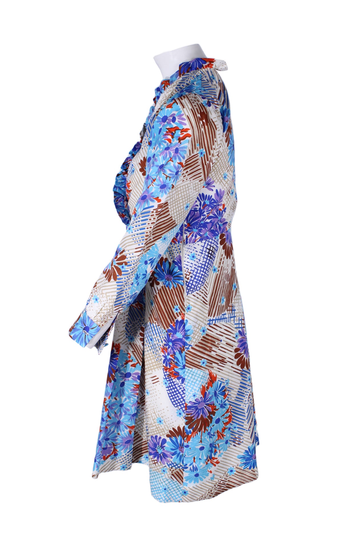 profile of dress with floral print throughout, long sleeves, and zip closure at side. 