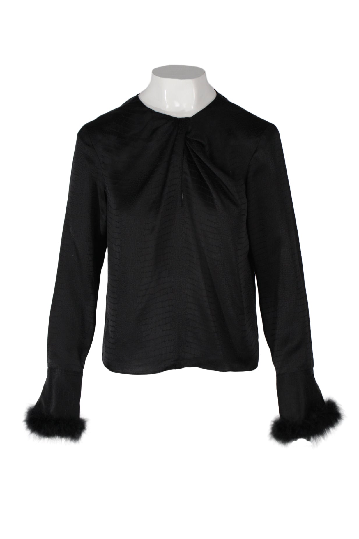 front angle frame black long sleeve silk top on feminine mannequin torso featuring round neckline with asymmetrical keyhole/pleat detail and feather-embellished cuffs.