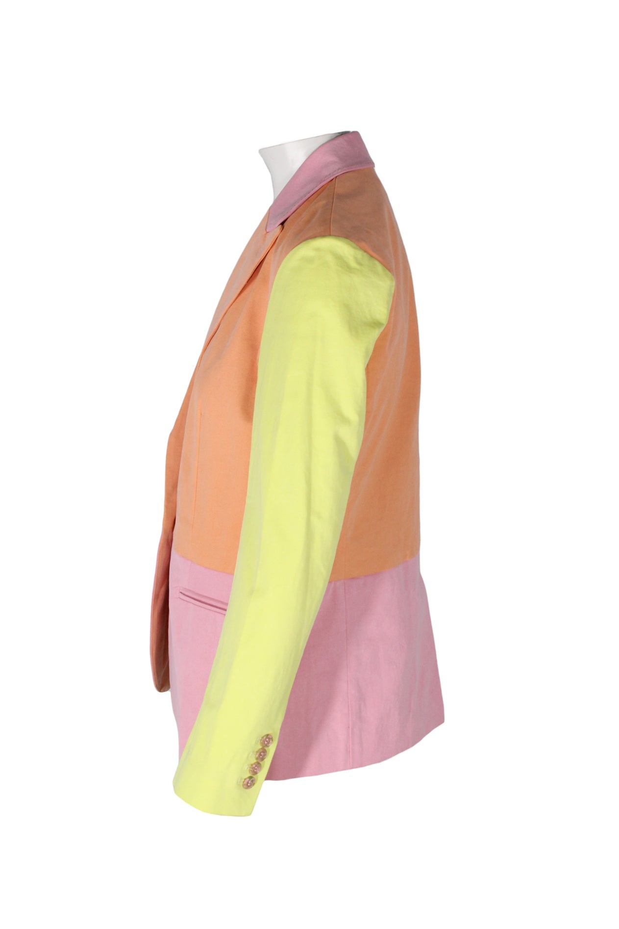 side angle tanya taylor pastel ‘darwin’ colorblock blazer on feminine mannequin torso featuring jetted lower pockets and decorative 4-button cuffs.