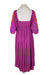 back angle free people 'wedgewood' embroidered maxi dress on feminine mannequin featuring orange floral/loop embroidery at sleeves and smocked upper back.