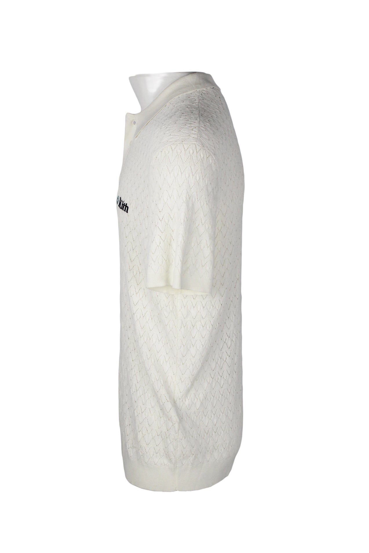 side angle of semi-sheer embroidered polo shirt. 