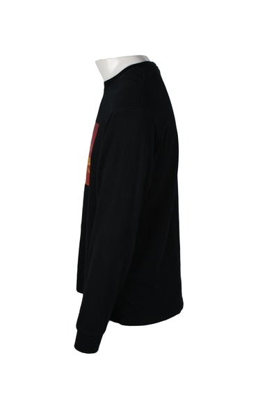 side angle of black long sleeve t-shirt. 
