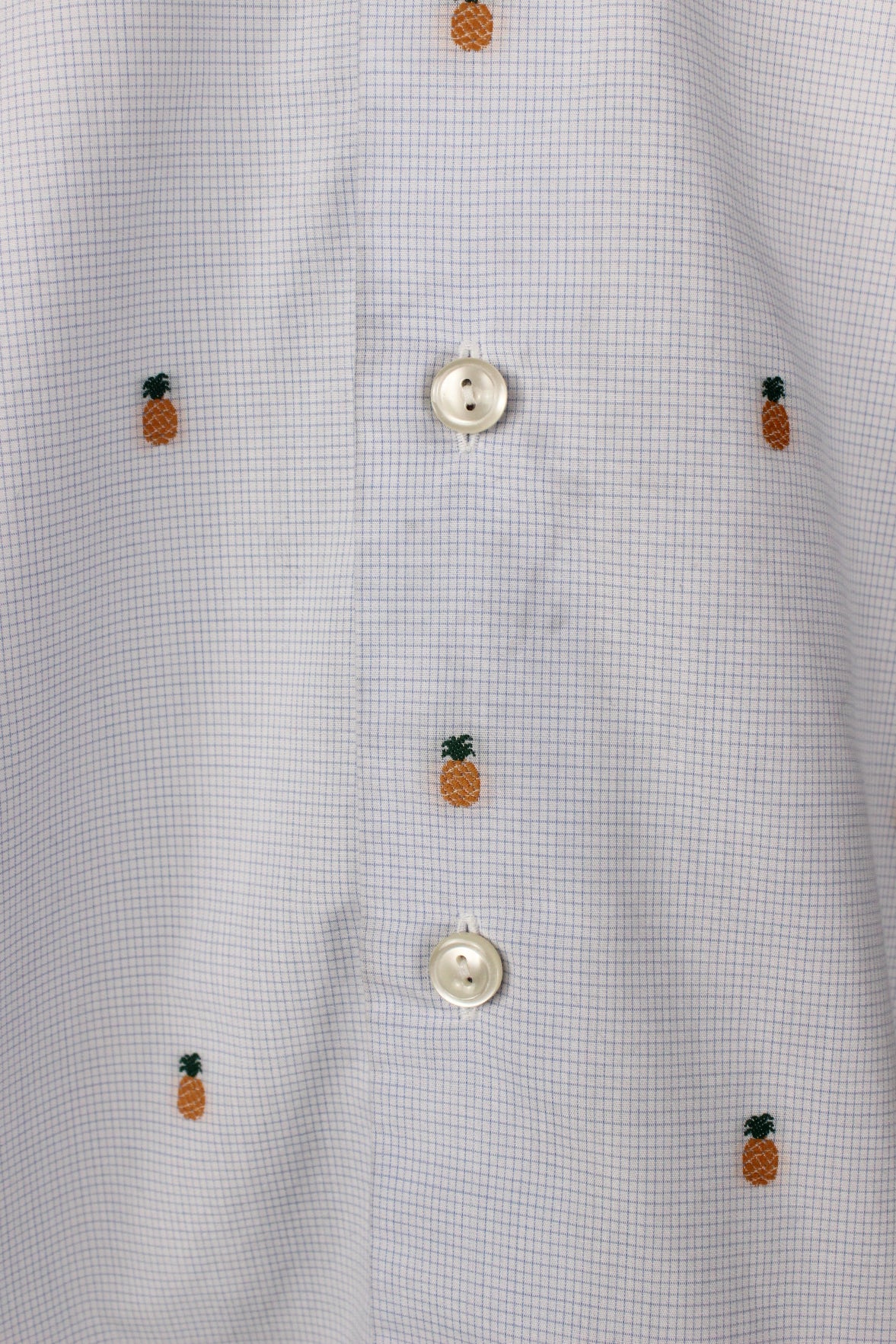 detail of one inch stain near button placket. 