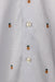 detail of one inch stain near button placket. 