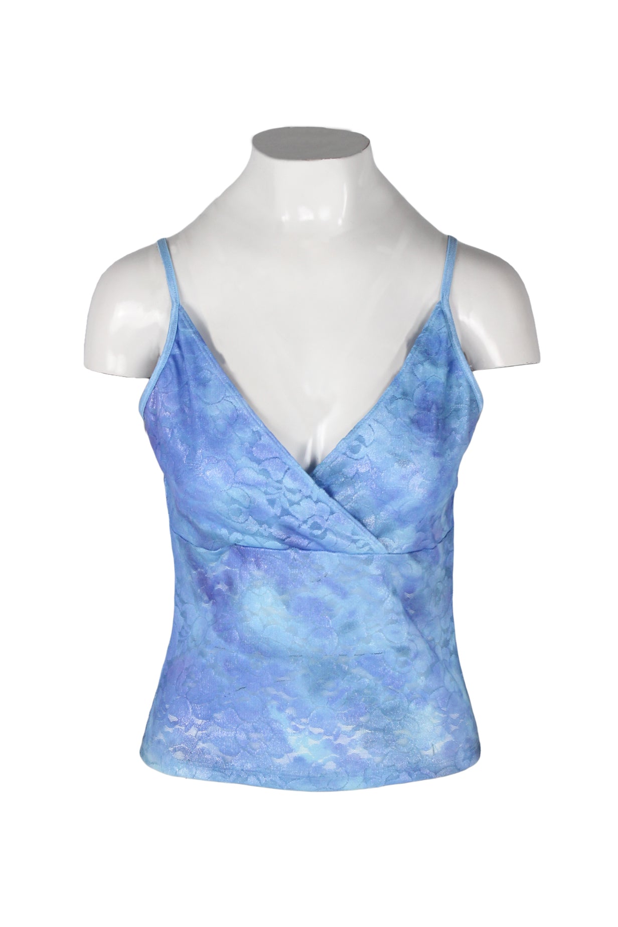 front angle of e.gen blue dyed sheer floral tank top on fem mannequin torso. features cross over v-neckline, opaque bust, spaghetti straps, and slight stretch to fabric. 