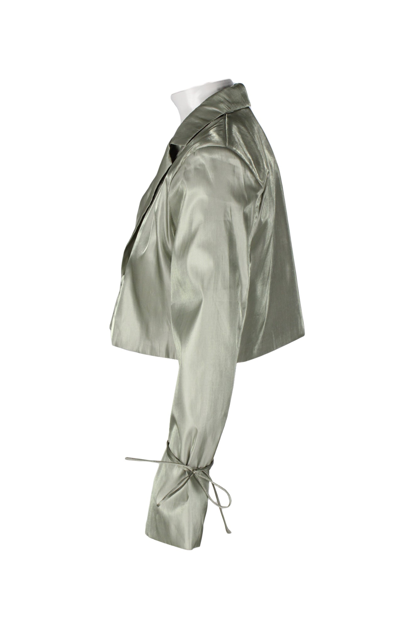 side of green shimmer cropped blazer.   