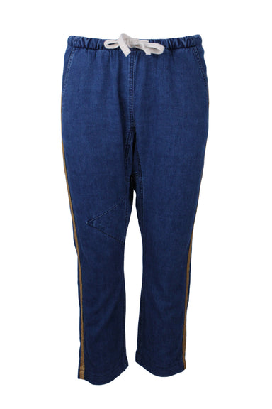 front of freecitysupershop blue denim cotton baggy pants. features gold metallic detail at sides, elasticized waist, drawstring, slashed pockets, and patch pocket at back right with brand tag.
