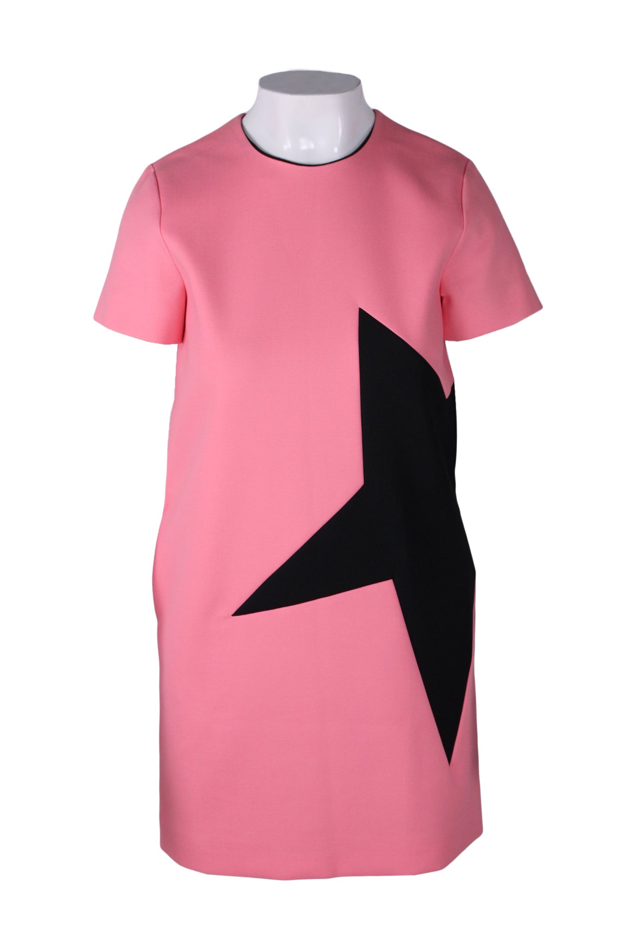 front of  msgm pink short sleeve dress. features crew neckline, maxi star detail at left side, side seam pockets, and straight fit.