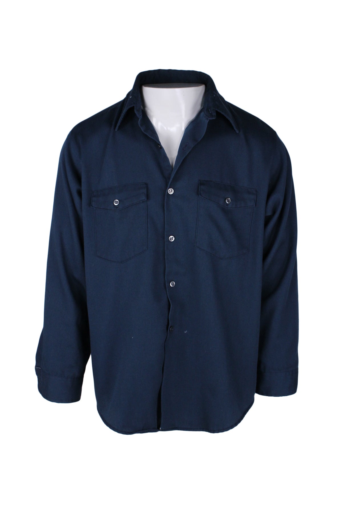 front angle of vintage big yank navy long sleeve button up shirt. features double breasted button flap pockets and buttons at cuffs.