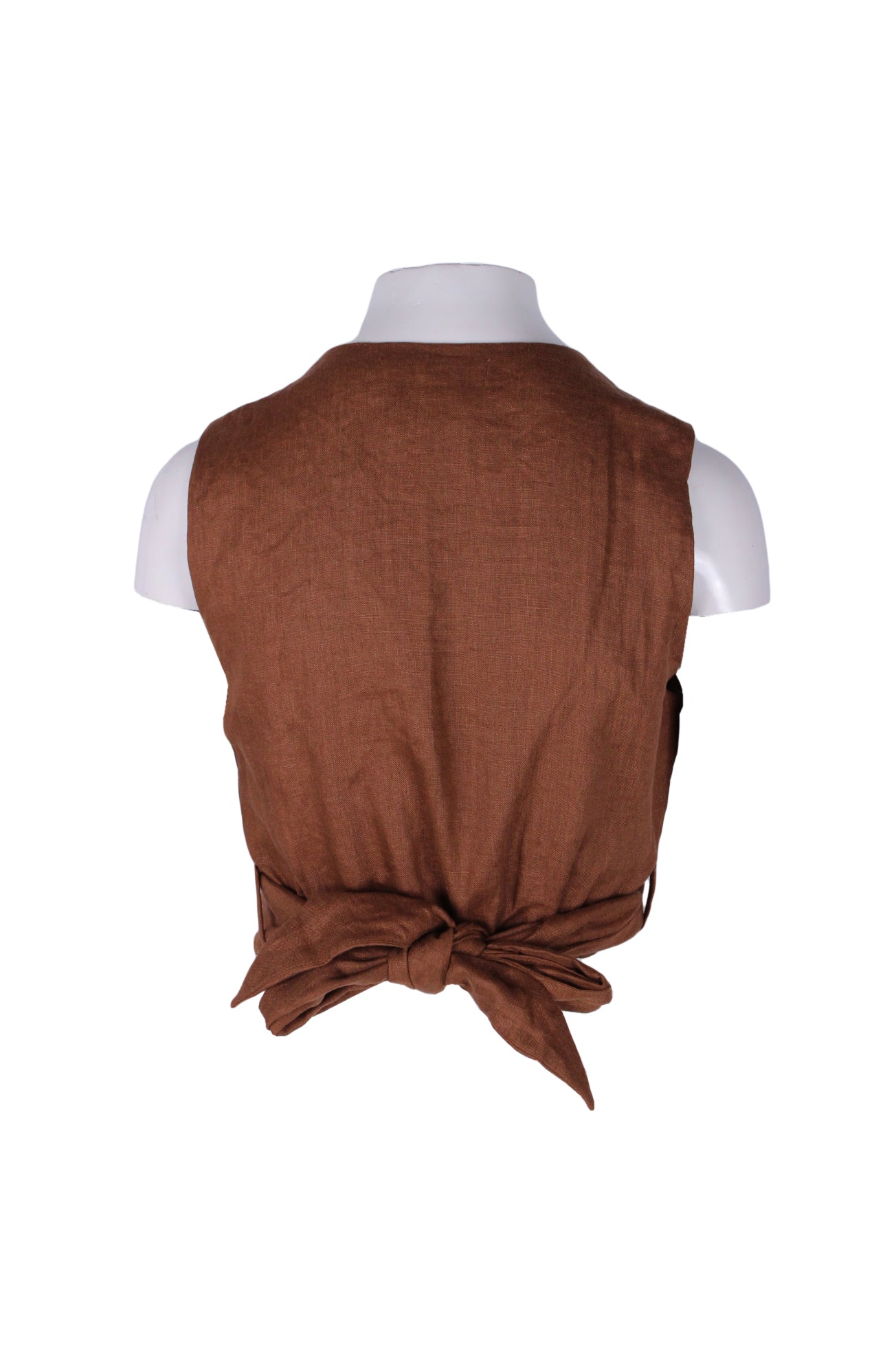 back angle of sleeveless linen wrap blouse. features attached tie which wraps around at back. 
