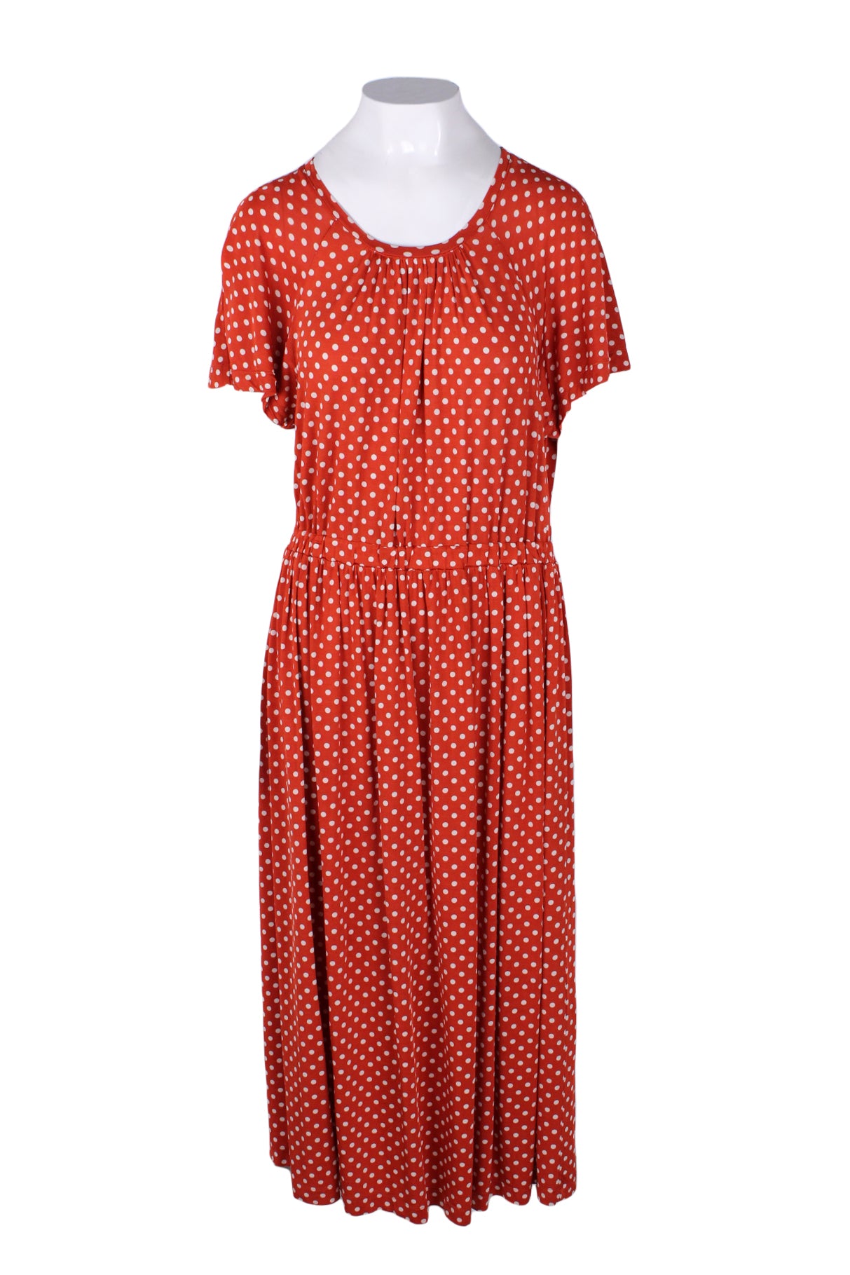 front of stine goya red short sleeve maxi dress. features rounded neckline, poa print throughout, tonal stitching, elasticized waist, and pull on style. 