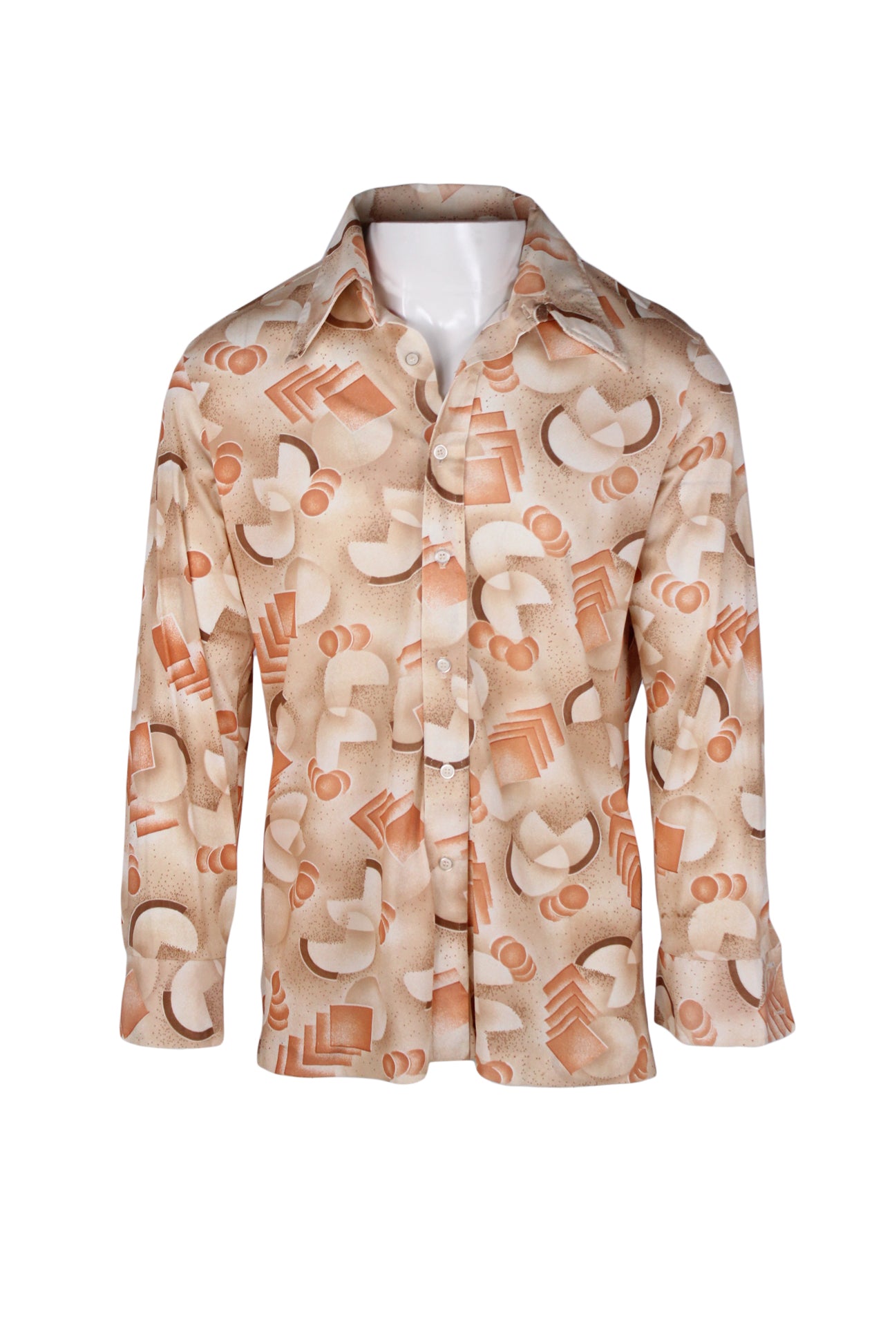 front view of vintage beige/peach/brown long sleeve button up shirt. features abstract pattern throughout, buttons at cuffs, and 70’s style collar.