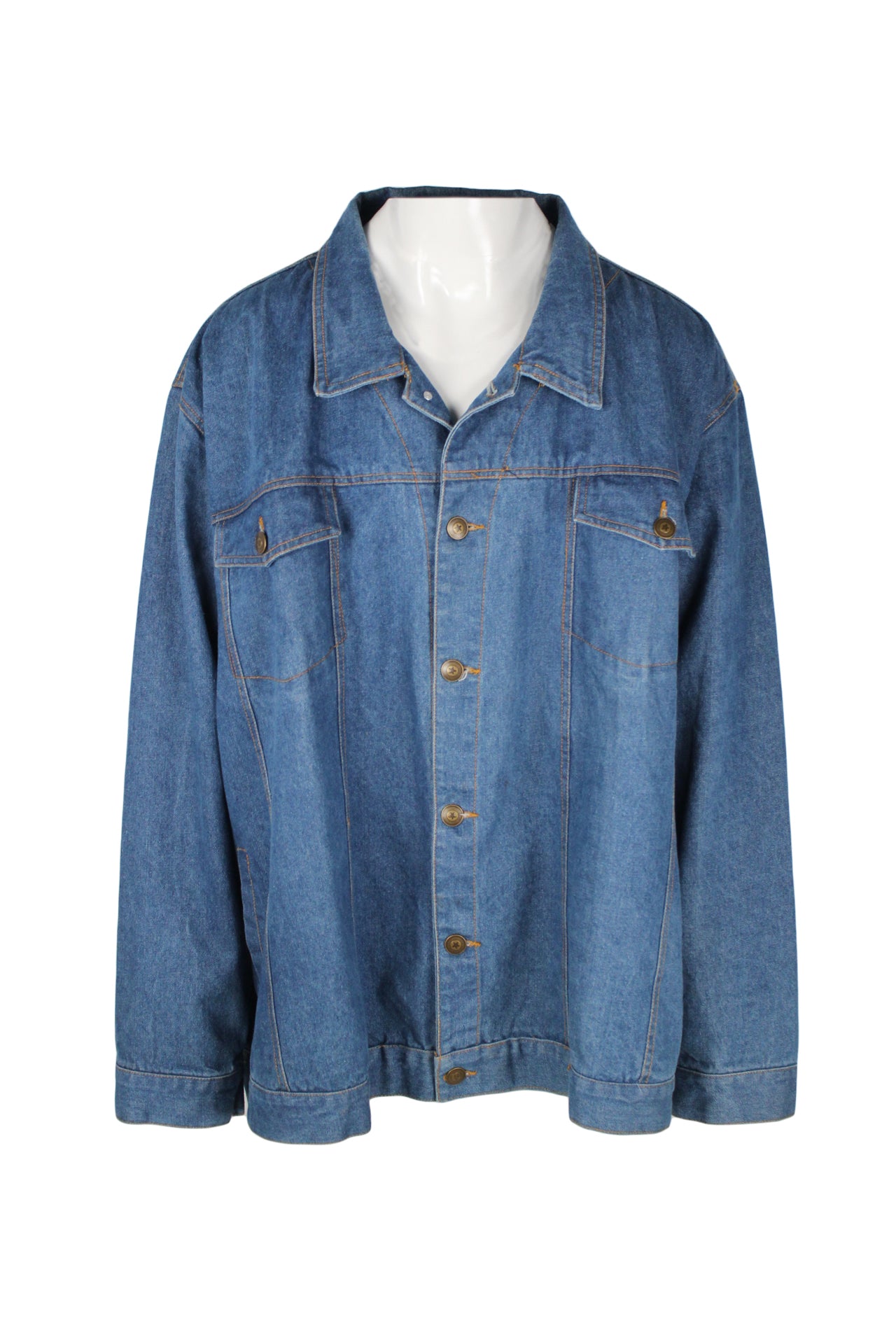 front angle of vintage duke haband blue denim jacket on masc mannequin. features brass toned button closure down center, buttoned breast pockets, pointed collar, side slit pockets, and orange topstitching. 
