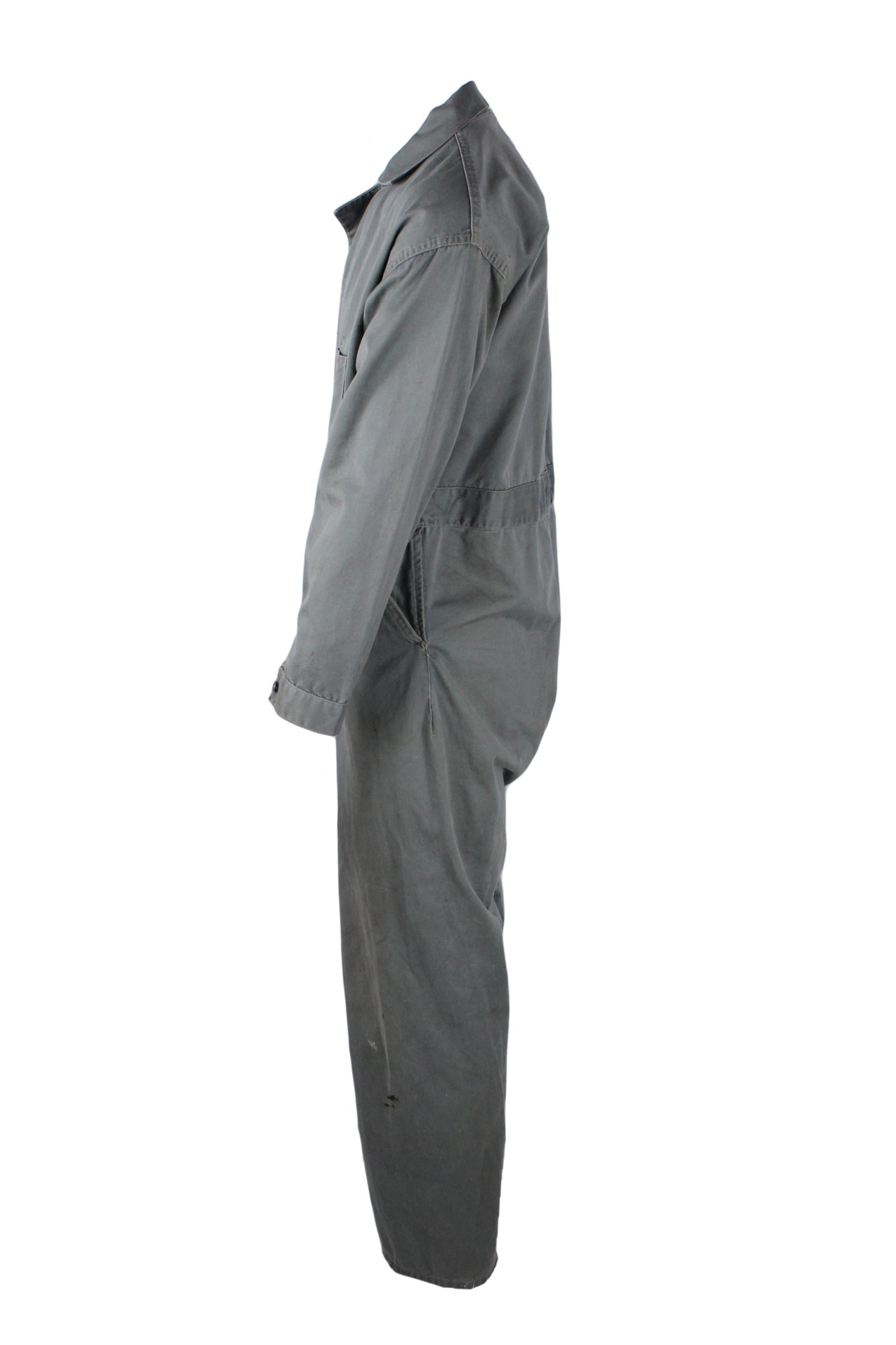 profile view with left sleeve and pocket of coveralls.