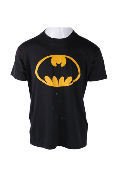 front angle of vintage bloopers! black batman t-shirt on masc mannequin. features yellow batman silhouette across chest, rounded ribbed collar, short sleeves, and single stitch hem/cuffs. 
