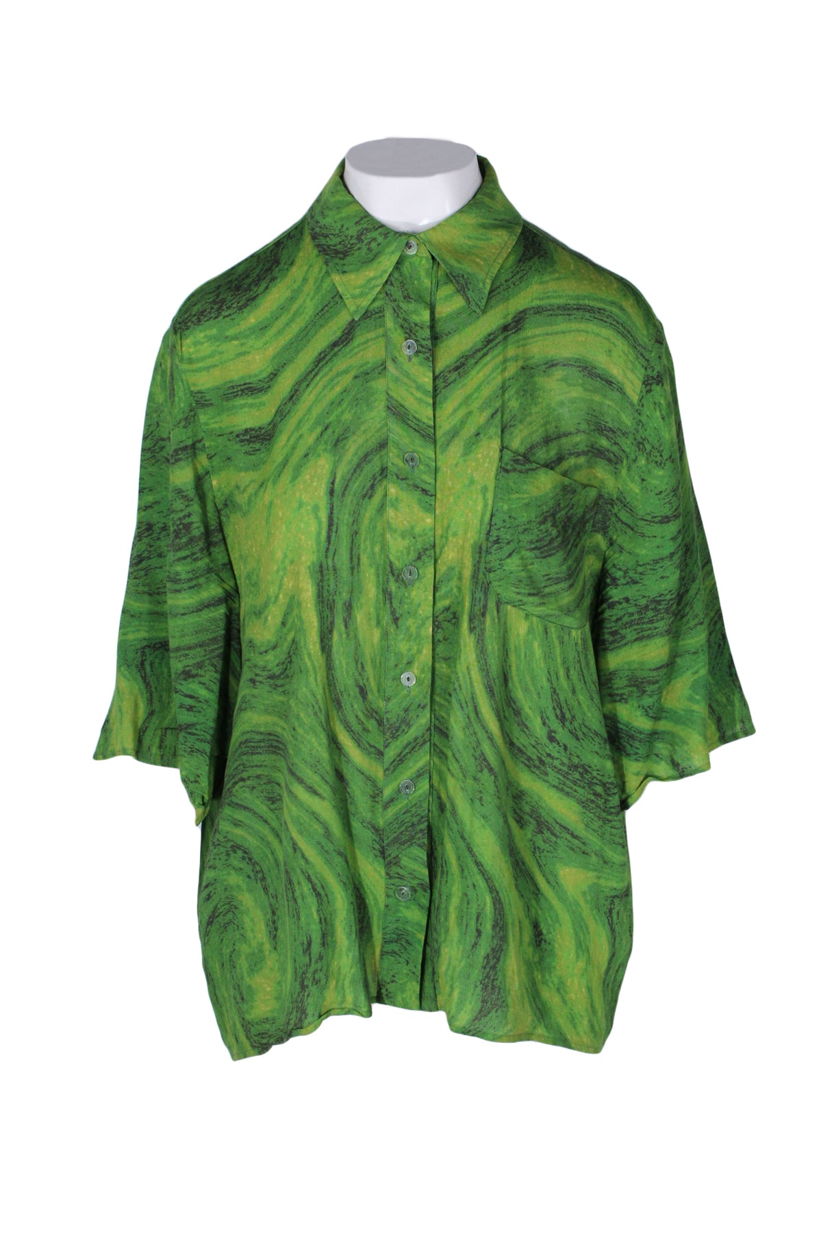 description: collina strada green swirl print short sleeve shirt. features collar, button down closure at center front, and loose fit. 