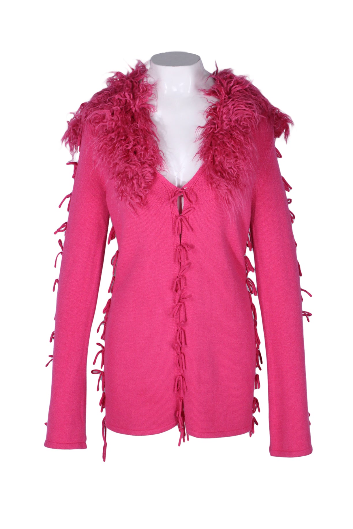 description: house of sunny pink peggy long sleeve fringe sweater. features form fitting cardigan, hits below hips, removable vegan fur collar, flared sleeves, tie-up closures at the front, sides and sleeves. 