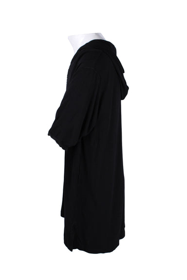 side angle of hooded tunic. 
